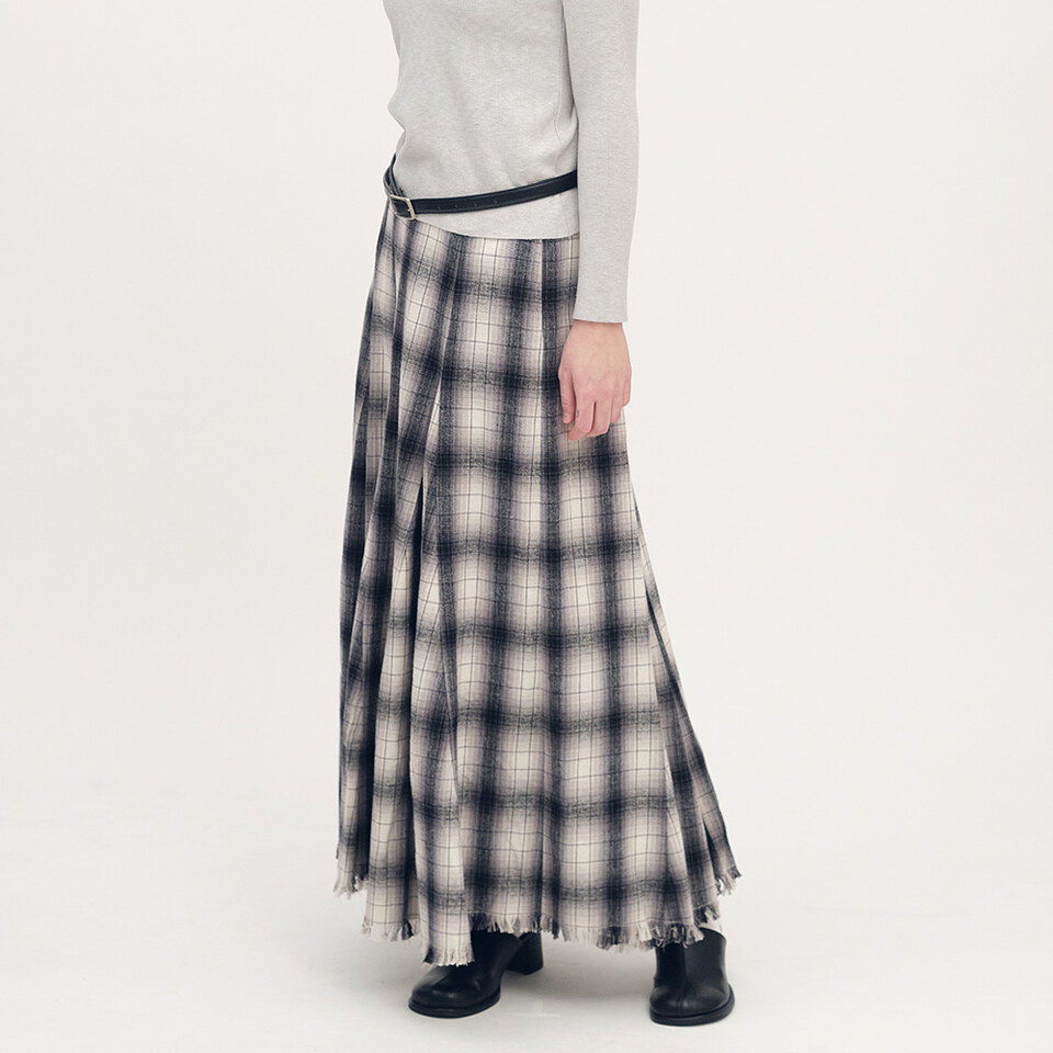流蘇下擺剪接格紋裙
