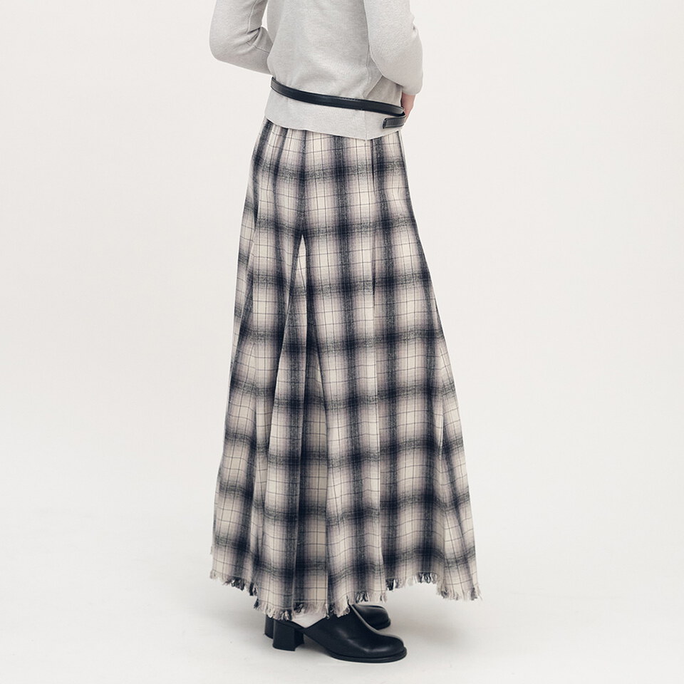 流蘇下擺剪接格紋裙