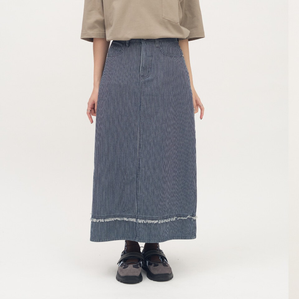 流蘇剪接丹寧裙