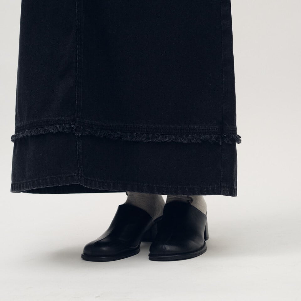 流蘇剪接丹寧裙