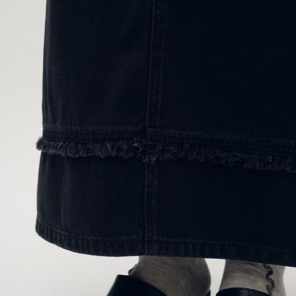 流蘇剪接丹寧裙