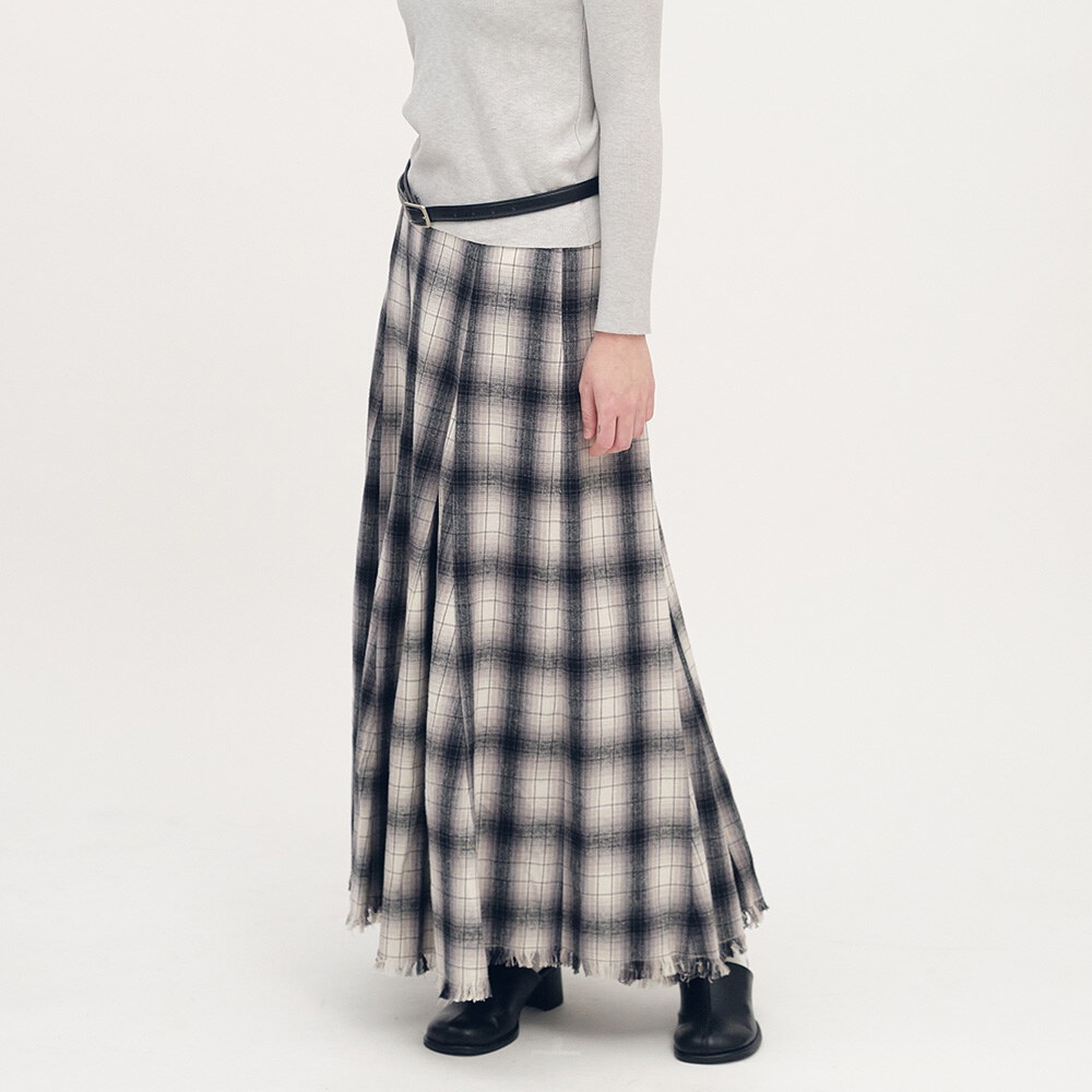 流蘇下擺剪接格紋裙
